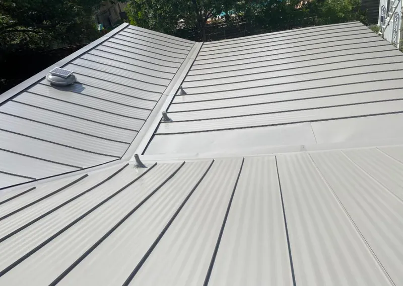 Solar attic fan installed on a metal roof for Roof Ventilation in Yorkshire